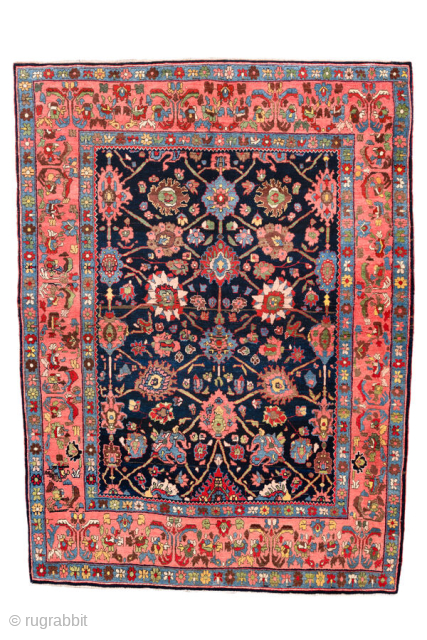 Antique Persian Bidjar Rug, circa 1900. Featuring an intricate floral design on a deep navy field with soft coral and light blue accents, framed by a lively pictorial border. Dense, durable weave ...