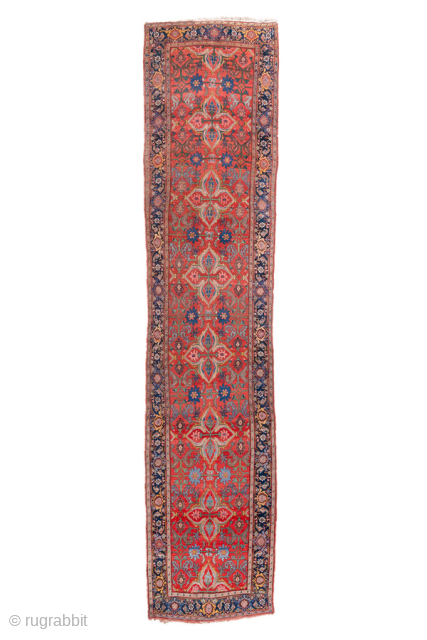 Antique Persian Bidjar Runner, circa 1900. Featuring an elegant repeating medallion design on a rich red field with deep indigo and ivory accents, framed by a classic floral border. Dense, durable weave  ...
