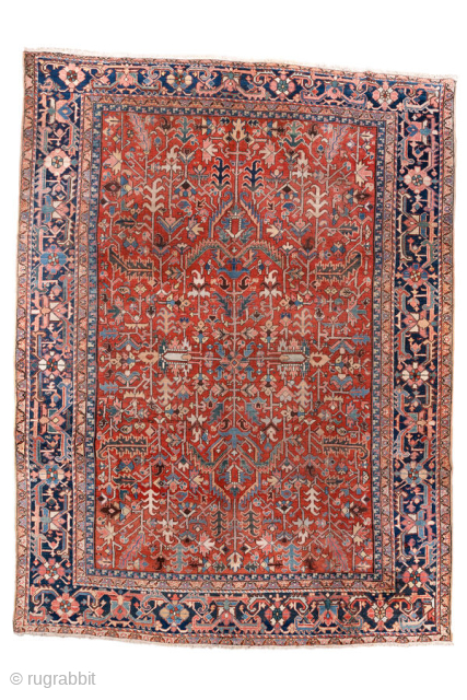 Antique Persian Heriz Carpet, circa 1900. Featuring an intricate allover floral design on a rich red field with deep indigo and ivory accents, framed by a bold Heriz border. Classic Northwest Persian  ...