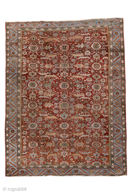 Antique Persian Heriz Carpet, circa 1900. Featuring an allover geometric lattice design on a warm rust field with soft blue and ivory accents, framed by a classic Heriz border. Bold Northwest Persian  ...