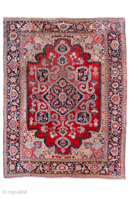 Antique Persian Serapi Carpet, circa 1900. Featuring a bold, stylized medallion on a vibrant red field with soft blue, ivory, and deep indigo accents, framed by a classic Heriz-style border. Grand Northwest  ...