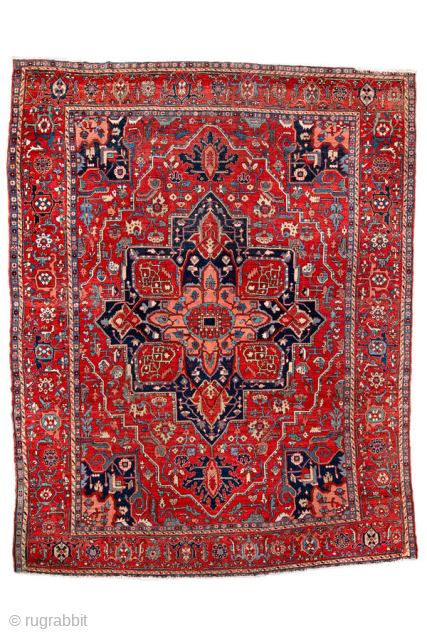Antique Persian Serapi Carpet, circa 1900. Featuring a bold geometric medallion on a richly saturated red field, accented by deep navy, ivory, and soft sky-blue tones. The spacious composition is filled with  ...