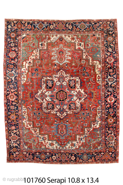 Antique Persian Serapi Carpet, Circa 1900. Dramatic ivory-centered medallion set within a richly colored brick-red field framed by a deep navy border. Bold geometry, spacious drawing, and exceptional craftsmanship.

10'8" x 13'4"

Item No:  ...