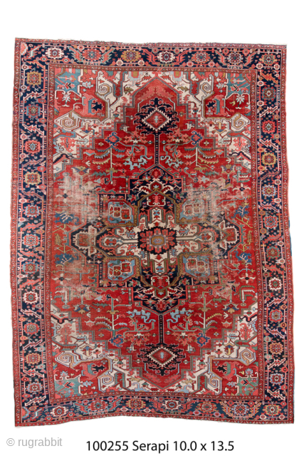 Antique Persian Serapi Carpet, Circa 1900. Striking elongated medallion set against a richly abrashed terracotta field framed by a deep navy border.
10'0" x 13'5"
Item No: 100255