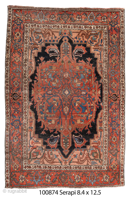 Antique Persian Serapi Carpet, Circa 1900. Striking midnight-blue stepped medallion on a rich terracotta field framed by vibrant red and ivory borders.

8'4" x 12'5"

Item No: 100874       