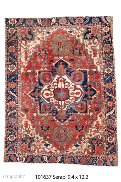 Antique Persian Serapi Carpet, Circa 1900. Bold ivory cruciform medallion set within a vibrant brick-red field framed by a richly detailed indigo border.

9'4" x 12'2"

Item No: 101637      