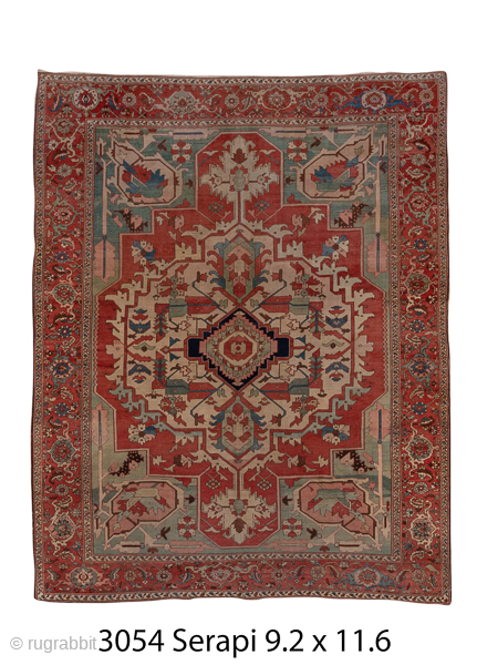 Antique Persian Serapi Carpet, Circa 1900. Features a bold stepped medallion set within a warm coral-red field highlighted by soft ivory, blue, and sage-green accents.

9'2" x 11'6"

Item No: C03054    
