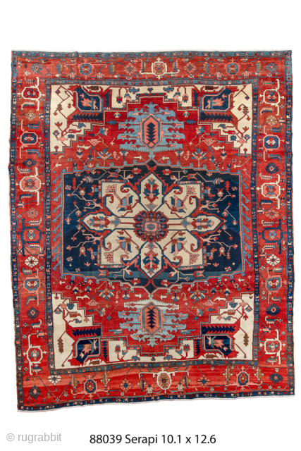 Antique Persian Serapi Carpet, Circa 1900. Bold ivory and indigo cruciform medallion surrounded by a vibrant brick-red field and framed by an intricately detailed geometric border.

10'1" x 12'6"

Item No: 88039   