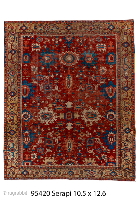 Antique Persian Serapi Carpet, Circa 1900. Rare allover design with richly detailed geometric and botanical motifs woven across a vibrant brick-red field, framed by an elegant camel border.
10'5" x 12'6"
Item No:95420