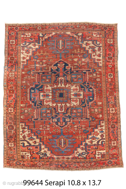 Antique Persian Serapi Carpet, Circa 1900. Commanding geometric medallion framed by a warm terracotta field and striking ivory spandrels.
10'8" x 13'7"
Item No: 99644