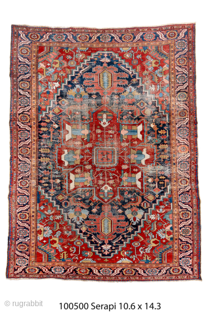Antique Persian Serapi Carpet, Circa 1900. Dramatic stepped medallion surrounded by richly abrashed indigo and terracotta tones framed by an elegant navy border.

10'6" x 14'3"

Item No: 100500      