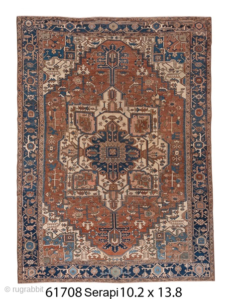 Antique Persian Serapi Carpet, Circa 1900. Striking geometric medallion set within a warm terracotta field and framed by a richly detailed navy border.
10'2" x 13'8"
Item No: 61708