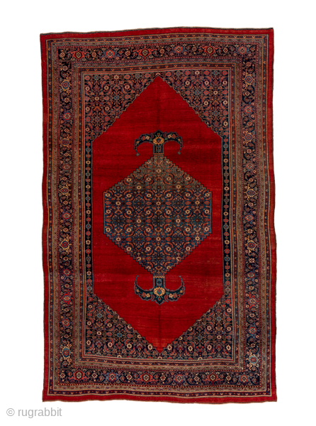Antique Persian Bidjar Carpet, Circa 1910. Showcases a rare open crimson field centered by an elongated Herati medallion framed by finely detailed floral spandrels and an elegant navy border.

9'1" x 14'5"

Item No:  ...