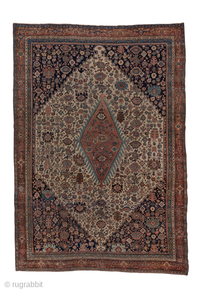 Antique Persian Bidjar Carpet, Circa 1910. Elegant ivory Herati field with an elongated rust diamond medallion framed by deep navy corner spandrels and a finely detailed floral border.
8'10" x 12'6"
Item No: 56181