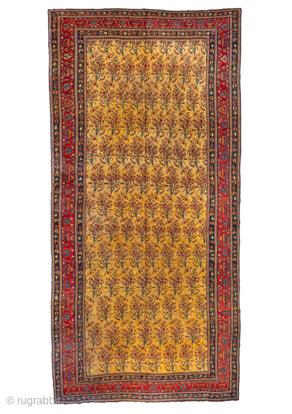 Antique Persian Bidjar Carpet, Circa 1900. rare allover Millefleurs design woven across a luminous golden camel field filled with delicate floral motifs and framed by richly detailed crimson borders.
13'7" x 27'9"
Item No: ...