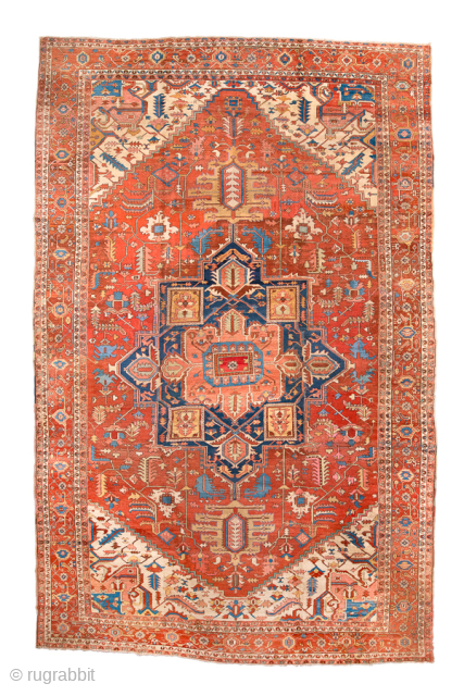 Antique Persian Serapi Carpet, Circa 1900. Striking geometric medallion set within a richly abrashed terracotta field accented by ivory spandrels and a finely detailed floral border.
11'9" x 18'5"
Item No: 99497