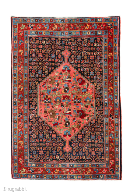 Antique Persian Bidjar Rug, Circa 1920. Vivid coral-pink diamond medallion against a richly detailed navy Herati field framed by colorful floral borders.

3'8" x 5'5"

Item No: 99789       