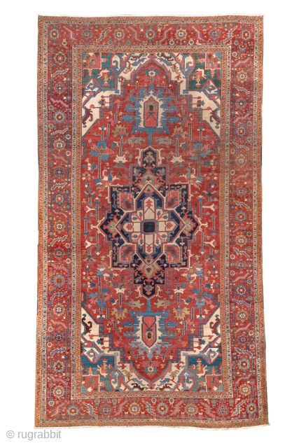 Antique Persian Serapi Carpet, Circa 1900. Striking elongated medallion set within a richly abrashed terracotta field highlighted by soft sky-blue accents and an elegant floral border.
11'0" x 20'0"
Item No: 99846