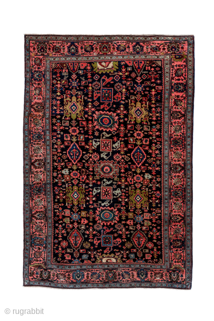 Antique Persian Bidjar Rug, Circa 1910. Detailed allover lattice of geometric floral motifs woven across a deep midnight blue field framed by an elegant rose-red floral border.

4'6" x 6'9"

Item No: 95419  