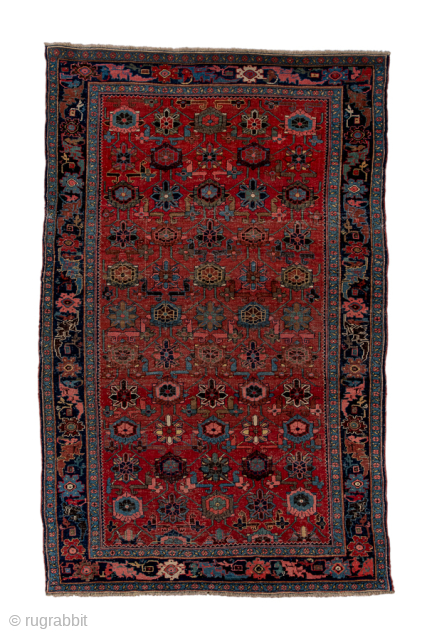 Antique Persian Bidjar Rug, Circa 1910. Refined allover lattice of stylized palmettes and geometric floral motifs woven across a rich terracotta field framed by a bold midnight blue floral border.

4'7" x 7'0"

Item  ...