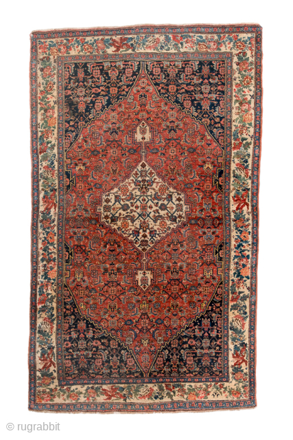 Antique Persian Bidjar Rug, Circa 1900. Finely drawn ivory diamond medallion set within a richly patterned terracotta field framed by an elegant ivory floral border.
4'9" x 8'1"
Item No: 98992