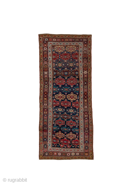 Antique Persian Bidjar Runner, Circa 1910. Finely woven allover lattice of stylized palmettes and geometric floral motifs across a rich midnight blue field framed by crisp ivory and terracotta borders.

3'7" x 8'3"

Item  ...