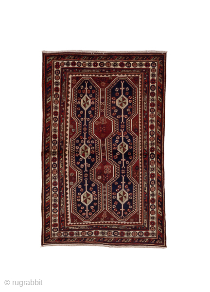 Antique Persian Kurdish Rug, Circa 1900. Rare compartmental design featuring paired columns of octagonal medallions woven in rich midnight blue and madder-red hues.

4'3" x 6'7"

Item No: C67679      