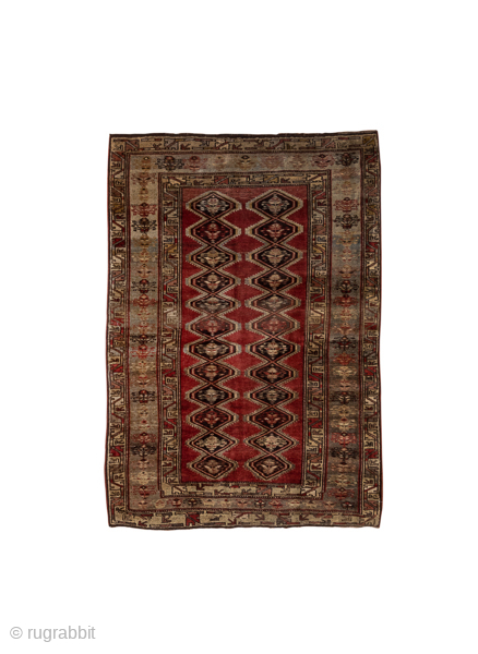 Antique Persian Kurdish Rug, Circa 1900. Striking series of hooked diamond medallions woven across a rich madder-red field framed by a softly aged camel geometric border.
4'3" x 6'0"
Item No: 78856