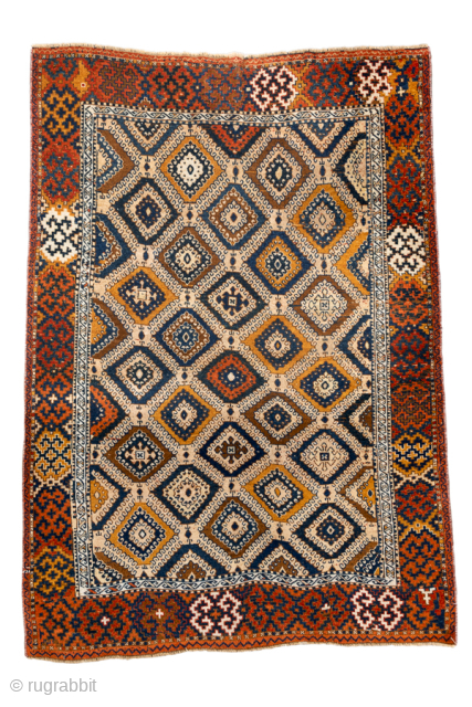 Antique Persian Kurdish Rug, Circa 1900. Vibrant allover lattice of hooked diamond medallions woven across a warm camel field framed by a bold geometric border.
4'3" x 6'0"
Item No: 99967
