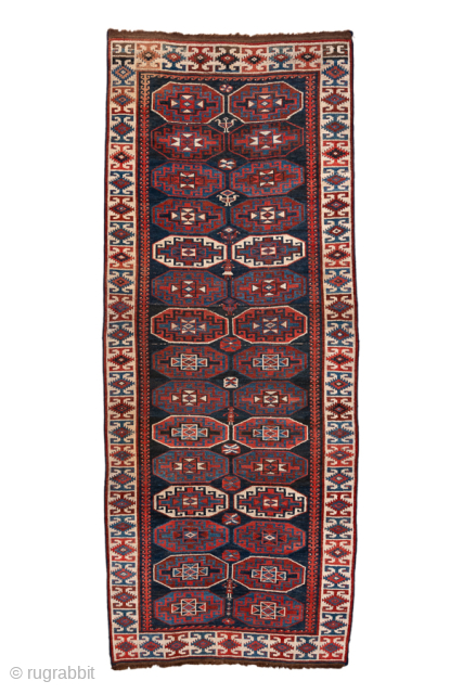 Antique Persian Kurdish Runner with Geometric Medallions, Circa 1900. Repeating geometric medallions across a rich deep-indigo field.
4'0" x 9'10"
Item No: 101241