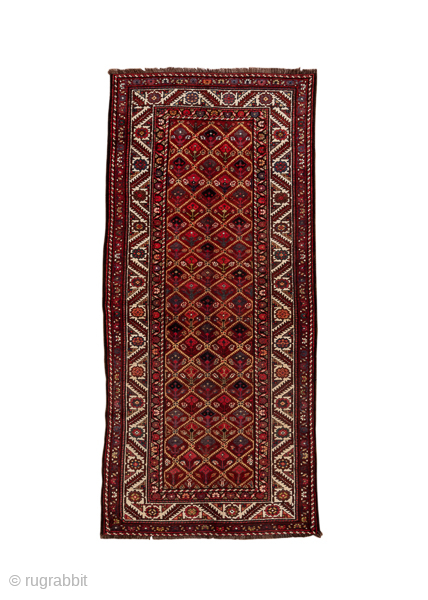 Antique Persian Kurdish Rug, Circa 1900. Finely woven allover lattice of small diamond medallions across a vibrant madder-red field framed by elegant ivory geometric borders.

4'0" x 8'5"

Item No: C6903    