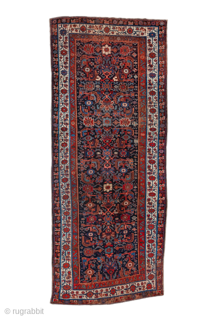 Antique Persian Kurdish Runne, Circa 1900. Dense Herati-inspired floral design across a rich deep-indigo field.
4'4" x 11'0"
Item No: 79086