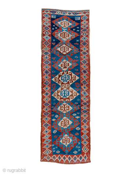 Antique Persian Kurdish Rug, Circa 1900. Dramatic series of hooked hexagonal medallions woven across a brilliant sapphire-blue field framed by vibrant serrated tribal borders.
2'9" x 8'8"
Item No: C93657