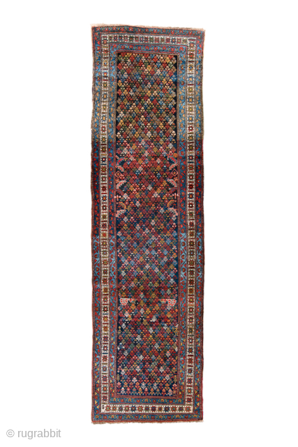 Antique Persian Kurdish Runner, Circa 1900. Dense allover geometric pattern on a deep indigo ground with subtle larger diamond formations.

3'4" x 11'8"

Item No: 986686         