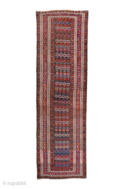 Antique Persian Kurdish Runner, Circa 1900. Dense allover arrangement of small geometric motifs organized in rhythmic horizontal rows.
3'7" x 12'0"
Item No: 99091