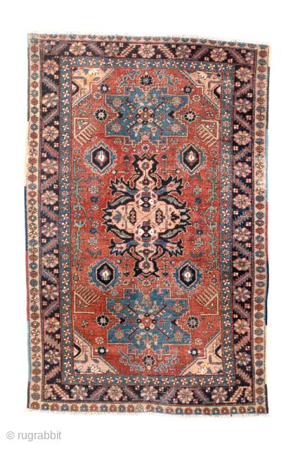 Antique Persian Heriz Rug with Geometric Medallion, Circa 1910. Bold geometric medallion surrounded by angular floral motifs on a warm madder-red field.

4'0" x 6'4"

Item No: 102014       