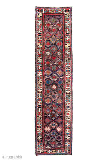 Antique Persian Kurdish Runner with Diamond Lattice Design, Circa 1900. Features an interlocking diamond lattice filled with colorful geometric floral motifs.
3'10" x 15'0"
Item No: 99056