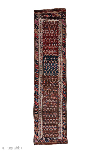 Antique Persian Kurdish Runner with Allover Geometric Design, Circa 1900. Features a dense allover geometric pattern arranged in rhythmic horizontal bands.
3'5" x 13'7"
Item No: B4816