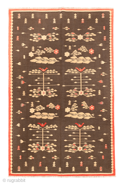 Vintage Bessarabian Kilim Rug with Floral and Bird Design, Circa 1940. Features a charming symmetrical arrangement of stylized flowering plants, birds, and small geometric motifs across a deep brown field.

6'2" x 9'9"

Item  ...