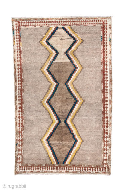 Vintage Persian Gabbeh Rug with Abstract Diamond Design, Circa 1940. Features four large linked diamond forms on a beautifully variegated natural wool ground.

2'10" x 4'5"

Item No: 102085      