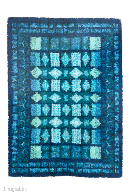 Vintage Swedish Rya Rug with Abstract Geometric Design, Circa 1960. Abstract geometric composition in layered shades of blue, turquoise, teal, and pale aqua.

5'4" x 7'4"

Item No: 102093      