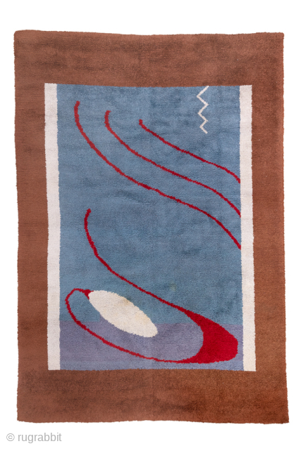 Vintage Swedish Modernist Rug with Abstract Design, Circa 1970. Striking abstract composition with sweeping red lines across a muted blue field, accented by ivory and lavender forms and framed in warm brown.
6'10" ...