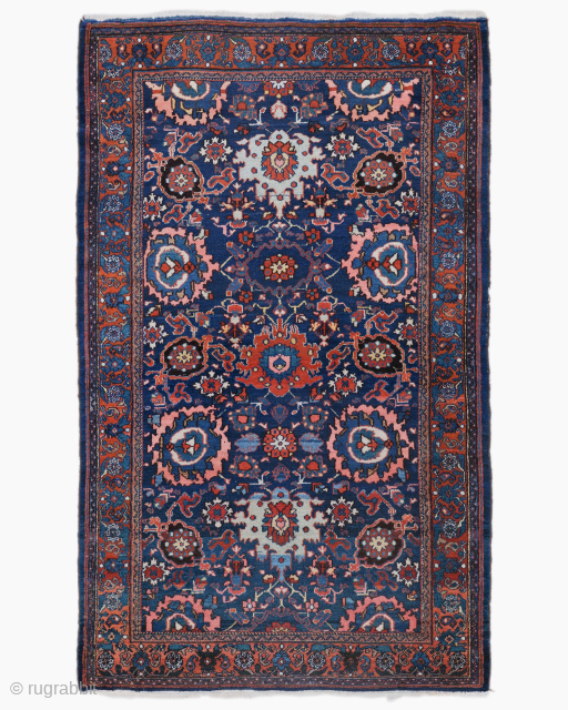 Period: Late 19th Century
Origin: Iran
Dimensions: 130 x 210 cm
This rare late 19th century Persian Mahal rug highlights a powerful and rhythmic floral composition featuring a vibrant, all over “Shah Abbasi” design of ...