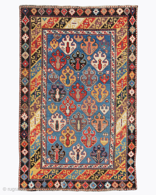 Period: Mid 19th Century
Origin: Shirvan, Caucasus
Dimensions: 95 x 148 cm

This rare mid 19th century Caucasian Shirvan rug highlights a powerful and rhythmic geometric composition featuring a vertical arrangement of offset “Lesghi star”  ...