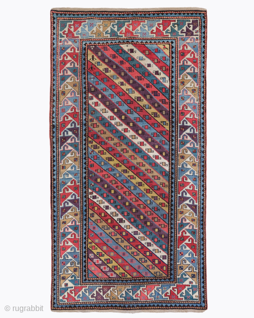 Period: Mid 19th Century
Origin: Gendje, Caucasus
Dimensions: 107 x 196 cm
This rare mid 19th century Caucasian Gendje rug highlights a powerful and rhythmic geometric composition featuring a vertical series of diagonal polychrome bands ...
