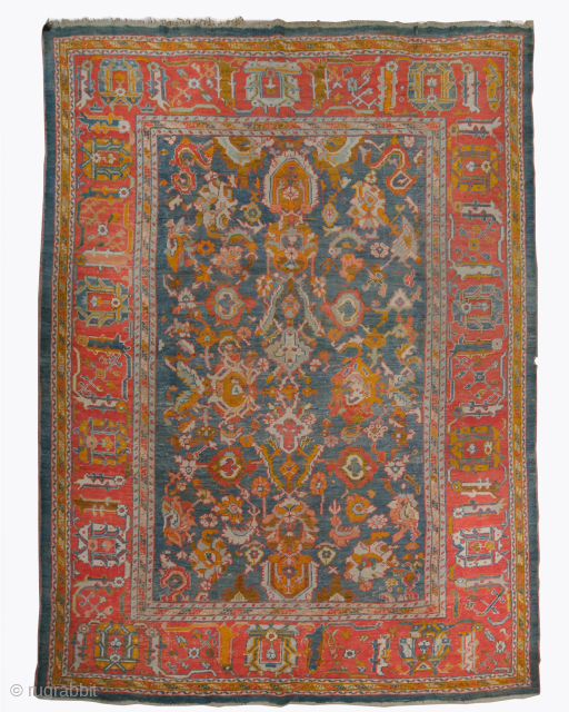 General Features:
Origin: Ushak, Western Anatolia, Ottoman Empire
Period: Late 19th century (c. 1880–1900)
Technique: Hand-woven
Material: Wool warp, weft and pile
Natural Dyes: Colored with natural dyes of plant and mineral origin
Size 323 x 440 cm  ...