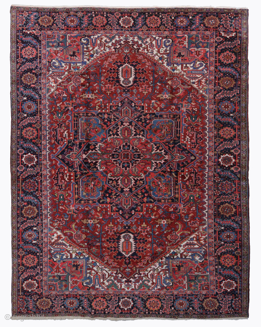 Period: Late 19th Century
Origin: Iran
Dİmensions: 295 x 400 cm

This rare late 19th century Heriz carpet is a magnificent and powerfully expressive example of Northwest Persian village weaving, celebrated for its robust structural  ...