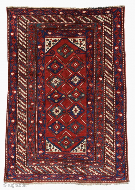 Late  of 19th Century South West Caucasian Lambalo Kazak

A classic specimen from the Lambalo region, with an extremely large border frame enclosing a diamond patterned central field.The characteristic border design, consisting  ...
