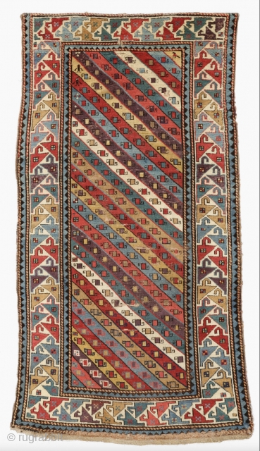 Middle Of the 19th Century Caucasian Gendje Rug, There İs A Small Hole Under The Center Of The Top Border, Size 107 x 196 cm
        