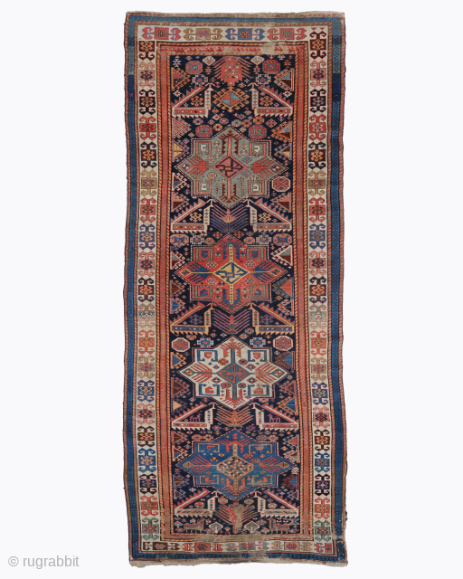 Period: Mid 19th century
Origin: Caucasus
Dimensions: 117 x 290 cm
This striking mid 19th century Akstafa rug was woven in the Caucasus and reflects the bold geometric vocabulary characteristic of traditional Caucasian weaving.
The composition ...